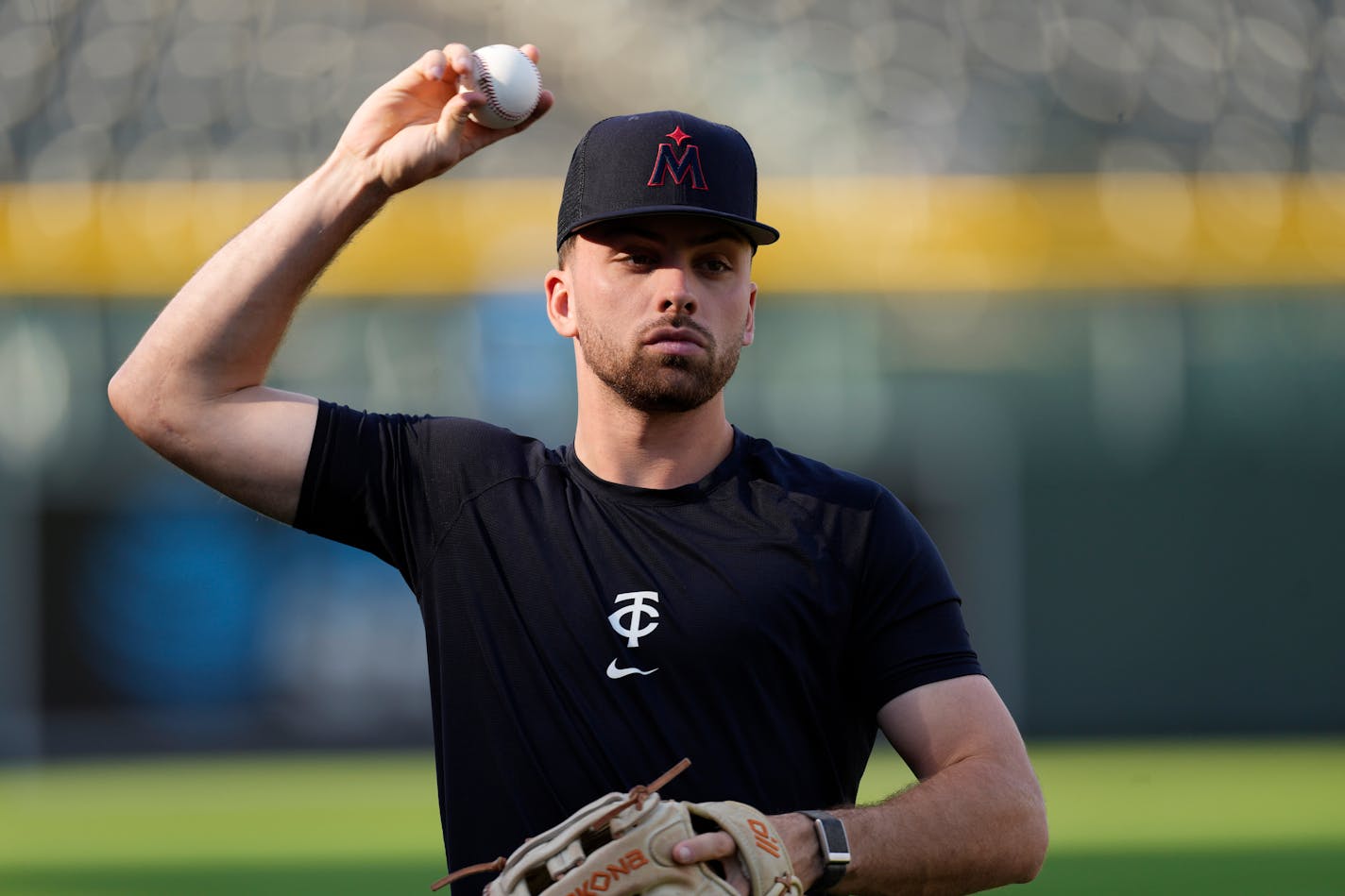 Minnesota Twins second baseman Edouard Julien warms up before a baseball game against the Colorado Rockies, Friday, Sept. 29, 2023, in Denver. (AP Photo/David Zalubowski)