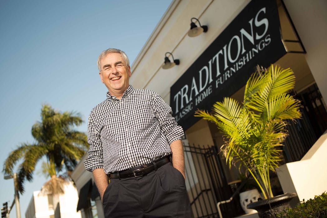 Mike Schumann, co-owner of Traditions Classic Home Furnishings, stood outside the Naples, Fla., store in 2013.