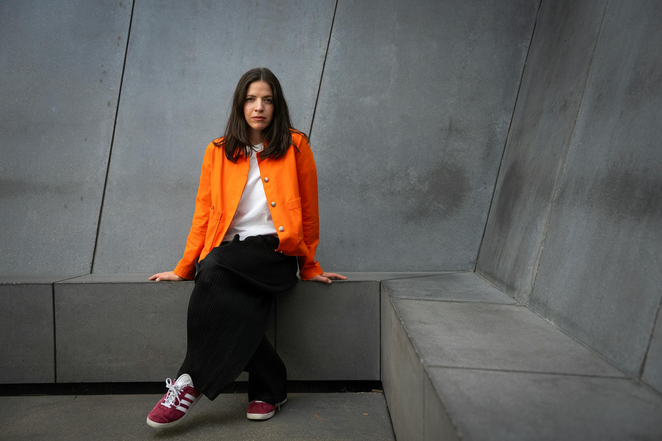 Rosario Güiraldes sits for a portrait inside the James Turrell's 'Sky Pesher' skyspace at the Walker Art Center in Minneapolis, Minn., on Wednesday, Aug. 16, 2023. Rosario Güiraldes is the new senior visual arts curator at the Walker Art Center. ] SHARI L. GROSS • shari.gross@startribune.com