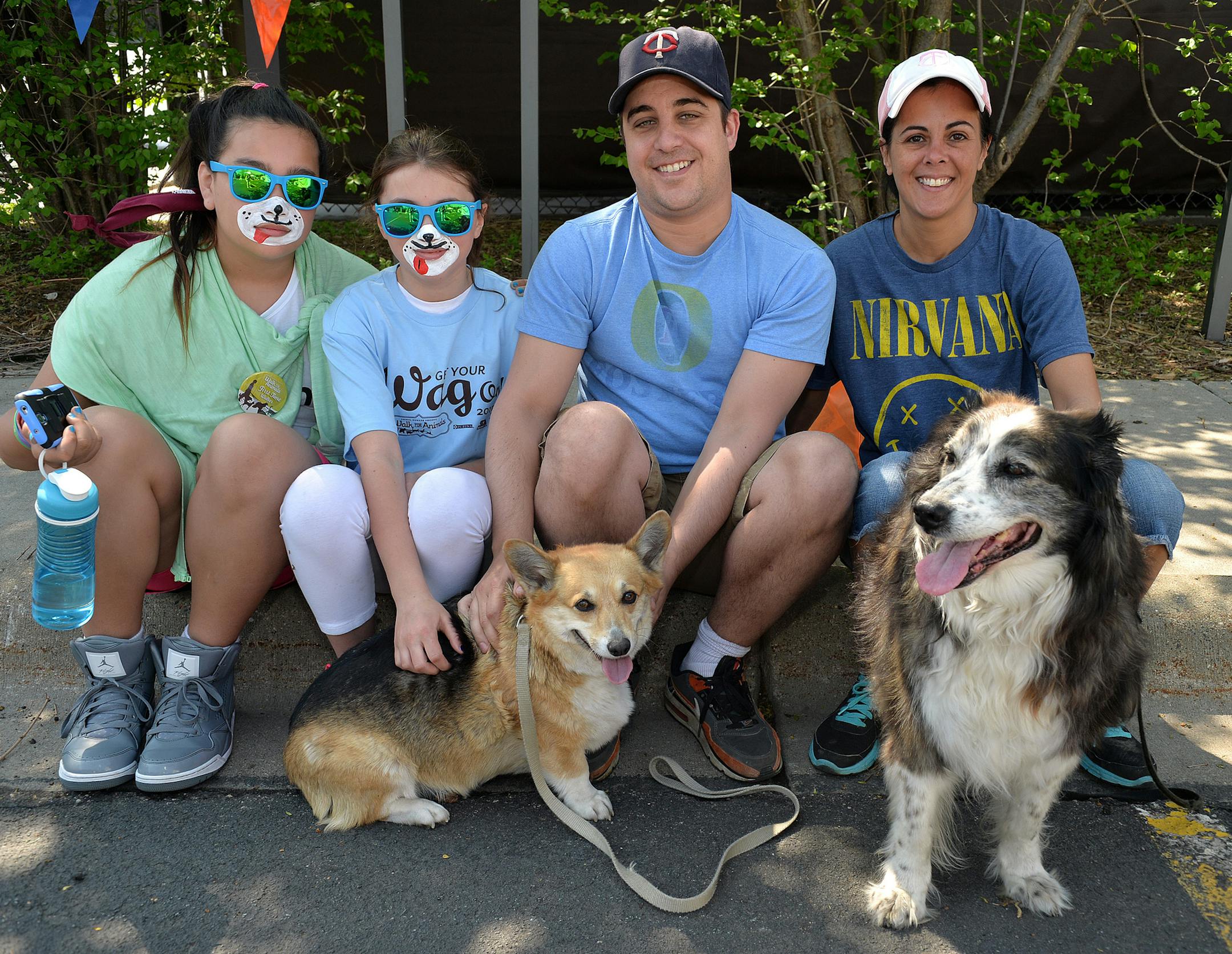 From left, Ashley Hurney, Maya Scheidemantle, Mike Morrison and Michelle Scheidemantle, with Annie, a Pembroke Welsh Corgi and Ringo, a Border Collie. ] (SPECIAL TO THE STAR TRIBUNE/BRE McGEE) **Ashley Hurney (left), Maya Scheidemantle (second from left), Mike Morrison (second from right), Michelle Scheidemantle (right), Annie (from left, Pembroke Welsh Corgi), Ringo (front right, Border Collie), Walk for Animals