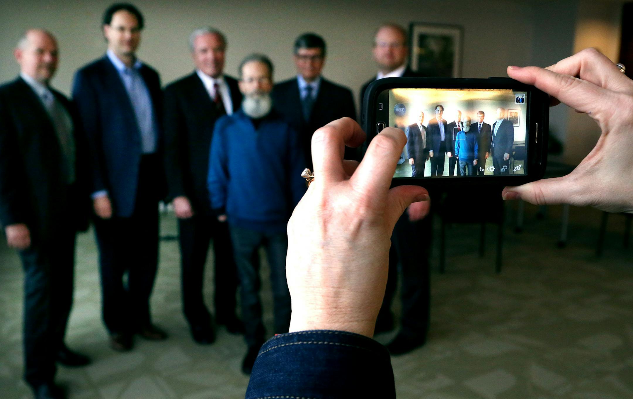 Left to right Virgil Bradley, Cornerstone Family Law LLC, Patrick R. Burns, Patrick Burns & Associates, John M. Degnan, Briggs and Morgan, P.A., Larry Stigen, Veteran, John A. Satorius, Fredrikson & Byron, P.A. and Patrick D.J. Mahlberg, Fredrikson &Byron, P.A posed for a photo Tuesday Monday April 21, 2015 in Minneapolis, Minnesota. Larry Stigen is a Vietnam veteran who went AWOL after a horrific firefight. For decades, he was ineligible for VA benefits and had been given an "unfit to serve" di