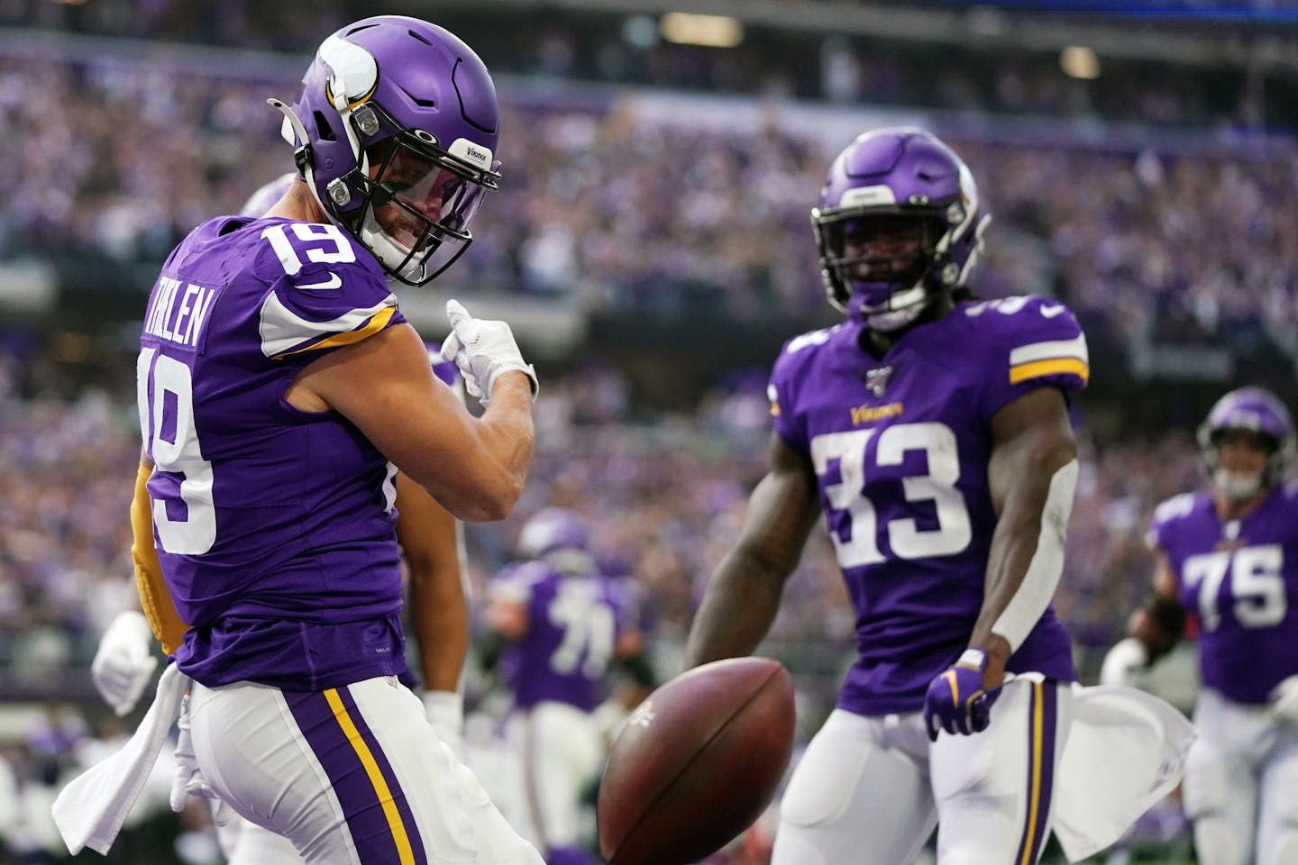 Minnesota Vikings wide receiver Adam Thielen (19) celebrated after he caught a touchdown pass from Minnesota Vikings quarterback Kirk Cousins (8) in the first half. ] ANTHONY SOUFFLE &#x2022; anthony.souffle@startribune.com The Minnesota Vikings played the Atlanta Falcons in their NFL season opener Sunday, Sept. 8, 2019 at U.S. Bank Stadium in Minneapolis.