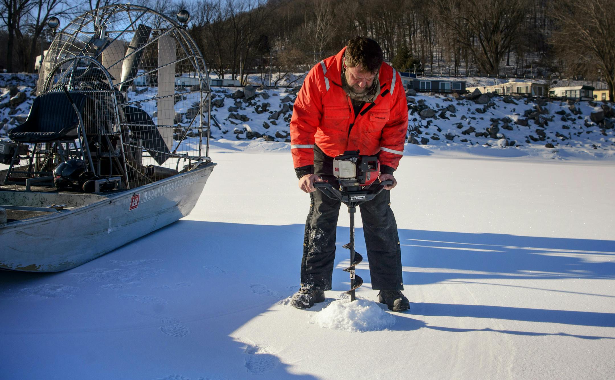 William Chelmowski drilled a test hole in the frozen Lake Pepin where ice was 16 inches thick. ] GLEN STUBBE * gstubbe@startribune.com Wednesday, February 17, 2016 A team from the U.S. Army Corps of Engineers tested the ice thickness on Lake Pepin, trying to get an estimate for when the first towboat might break through to St. Paul to open the season.