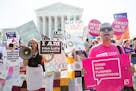 Pro-abortion rights and anti-abortion protesters rally in front of the U.S. Supreme Court in Washington, June 27, 2016.