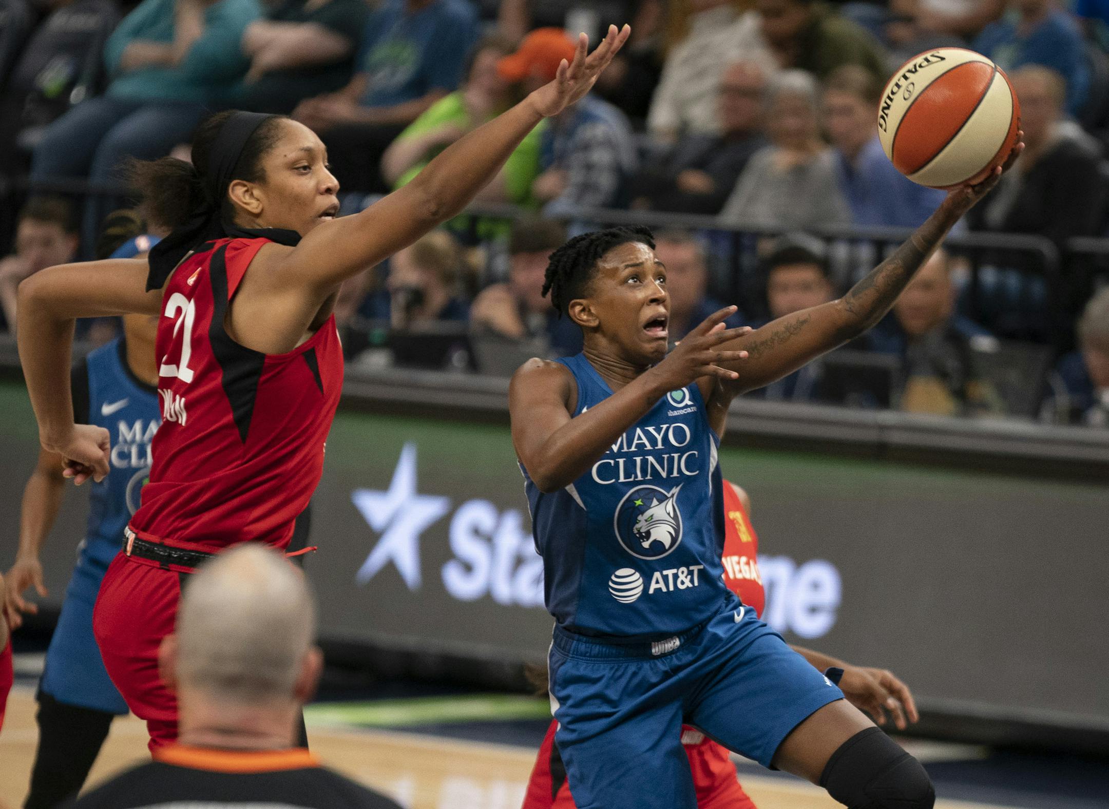 Minnesota Lynx guard Danielle Robinson (3) put up a first half shot under the defense of Las Vegas Aces center A'ja Wilson (22). Robinson finished with 23 points. ] JEFF WHEELER • jeff.wheeler@startribune.com The Minnesota Lynx faced the Las Vegas Aces in an WNBA basketball game Sunday night, August 25, 2019 at Target Center in Minneapolis.