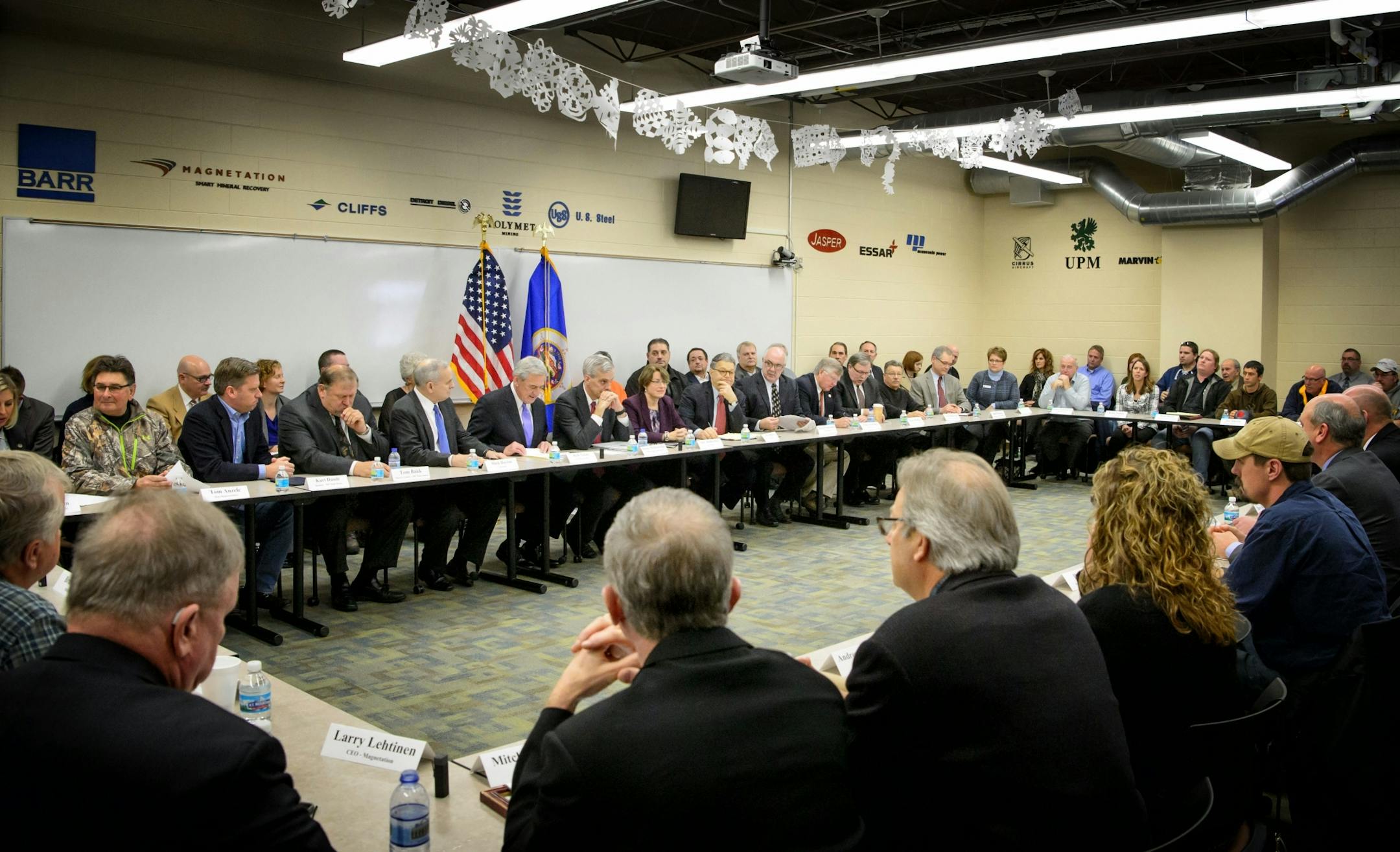 White House chief of staff Denis McDonough, center at the start of the meeting.