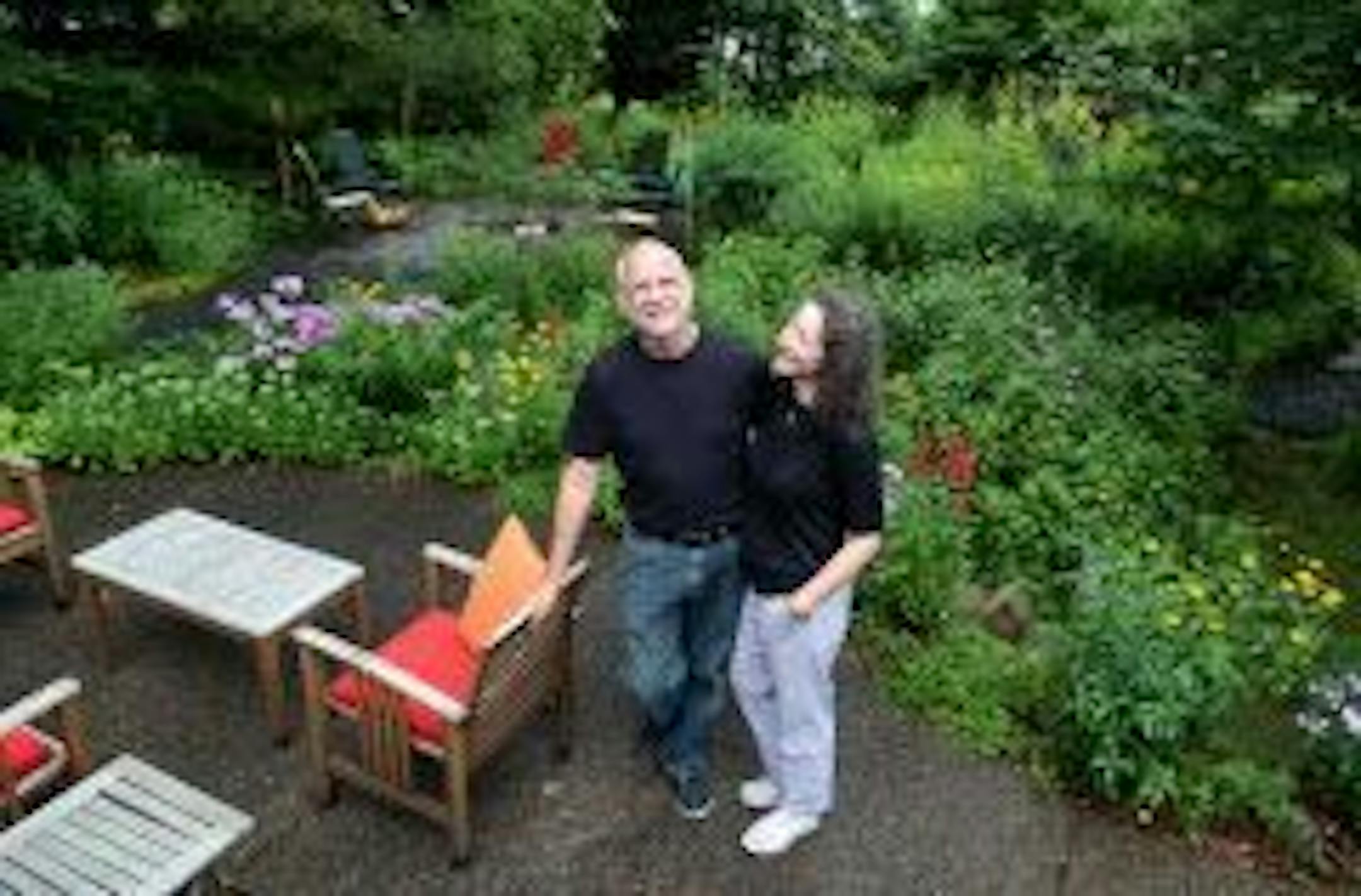 Jeremy and Amy-Ann Mayberg in their Edina garden. They inherited a prairie restoration when they bought their house, which sparked a fascination with native plants.