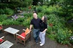 Jeremy and Amy-Ann Mayberg in their Edina garden. They inherited a prairie restoration when they bought their house, which sparked a fascination with 