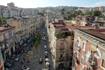 The working class Sanita neighborhood, once considered too dangerous to visit, now attracts tourists to its stunning churches and catacombs.