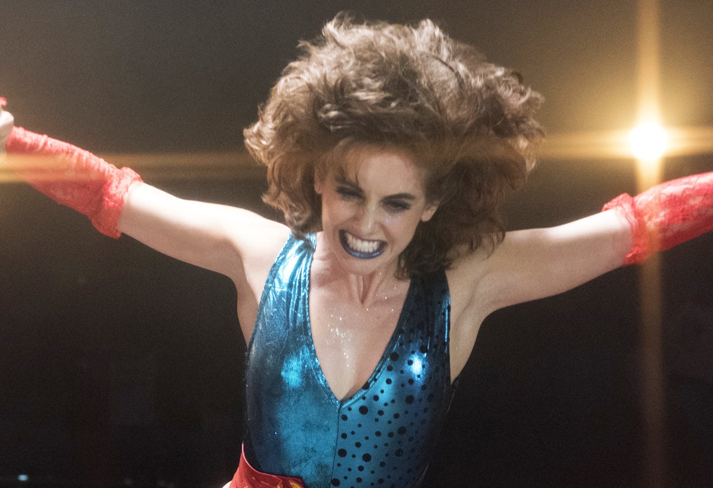 This image released by Netflix shows Alison Brie in a scene from "Glow." Brie was nominated for a Golden Globe award for best actress in a comedy series on Monday, Dec. 11, 2017. The 75th Golden Globe Awards will be held on Sunday, Jan. 7, 2018 on NBC. (Erica Parise/Netflix via AP)