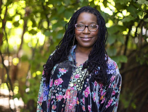 photo of author Tiya Miles in a garden