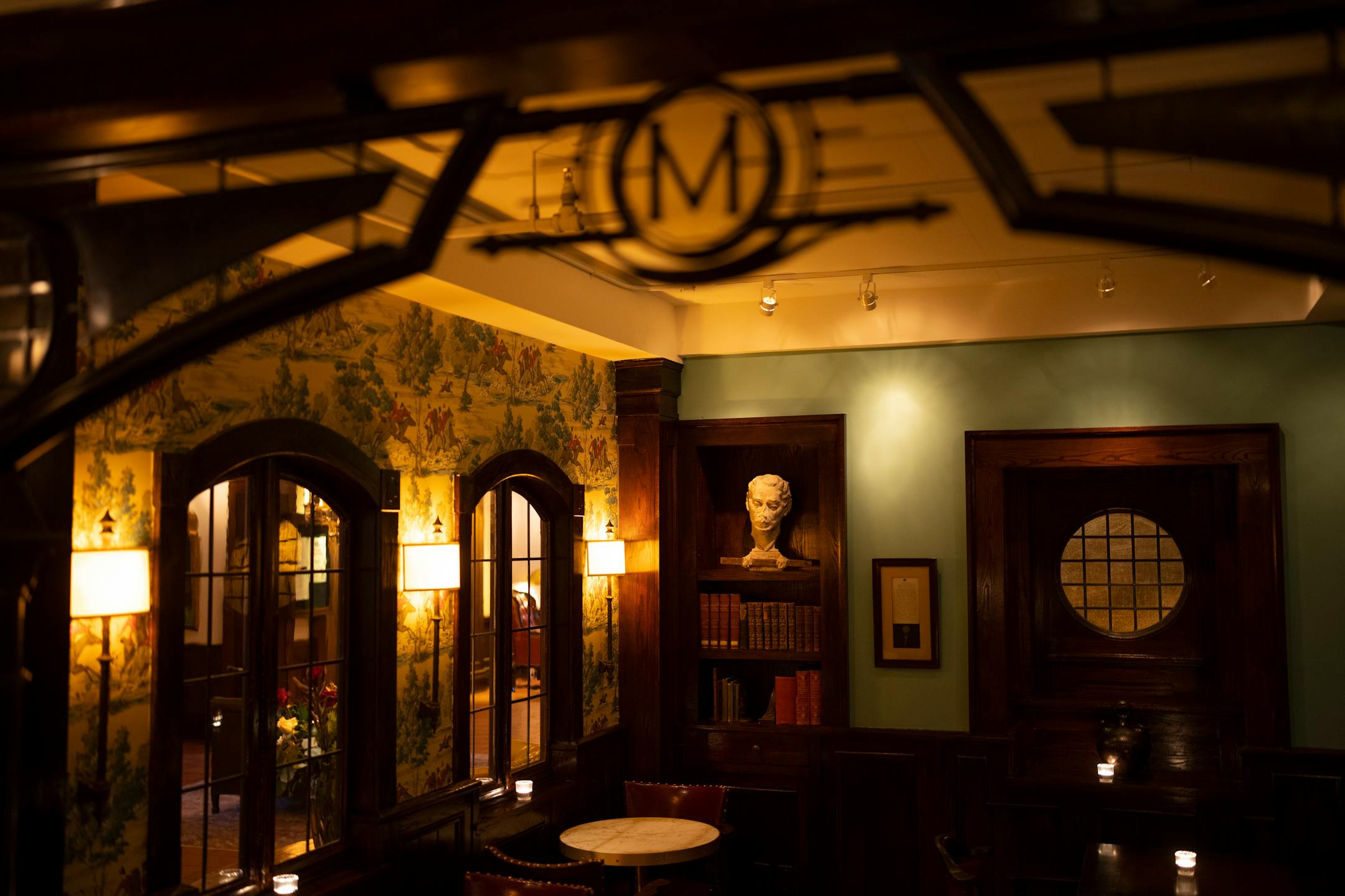 Period correct details give a cozy room off the bar in Charlie's at the Minneapolis Club the feel that it's been there forever.