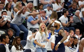 Wolves fans at Target Center celebrated Nickeil Alexander-Walker's three-pointer on Monday against the Thunder.