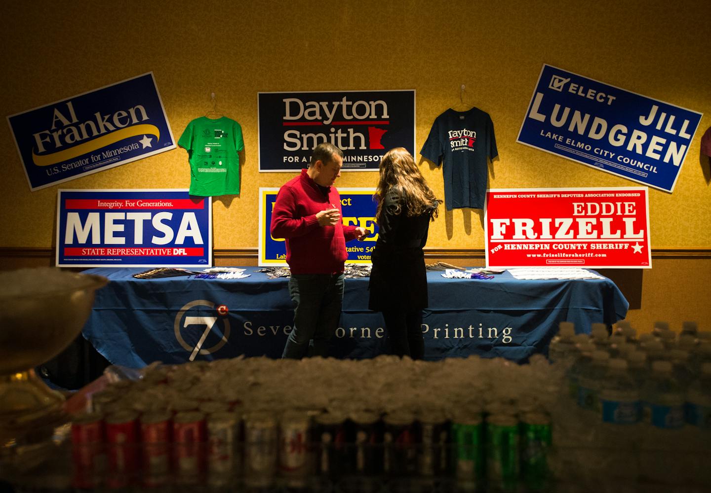 Rudy (cq) and Anna Rodriguez (cq), of Maple Grove, grab some "Ready for Hillary" pins Tuesday night at the election party at DFL Headquarters. ] AARON LAVINSKY &#x2022; aaron.lavinsky@startribune.com Photos from the election party at the DFL Headquarters Tuesday, Nov. 4, 2014 at the Hilton Hotel in Minneapolis.