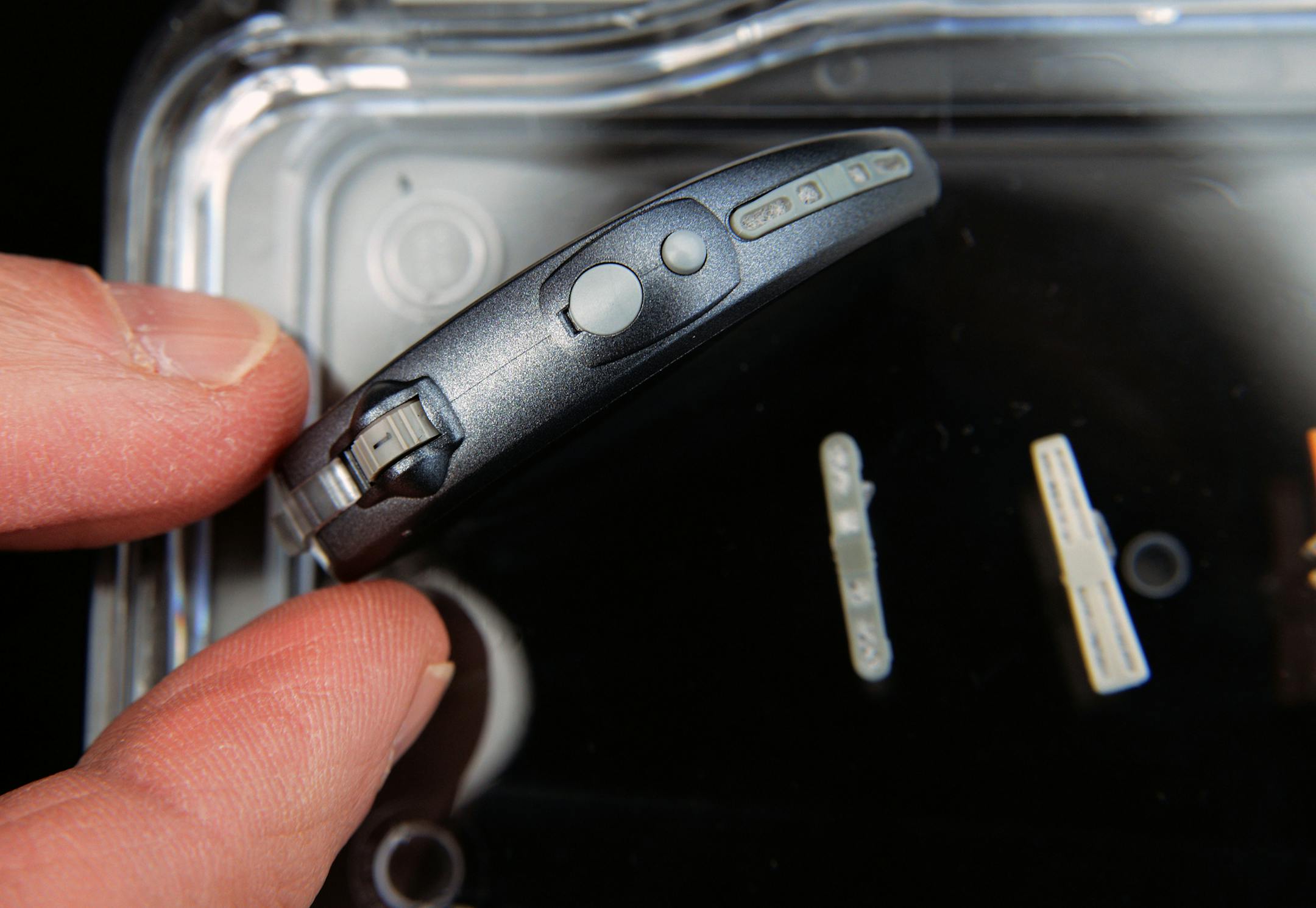 Vice President Peggy Herrmann of Donaldson Co. held several new products that use Donaldson filters that were adapted from its declining business of filters for disk drives inside PCs. These filters are used in hearing aids.] Richard.Sennott@startribune.com Richard Sennott/Star Tribune. , Bloomington Minn. Thursday 4/25/13) ** (cq)
