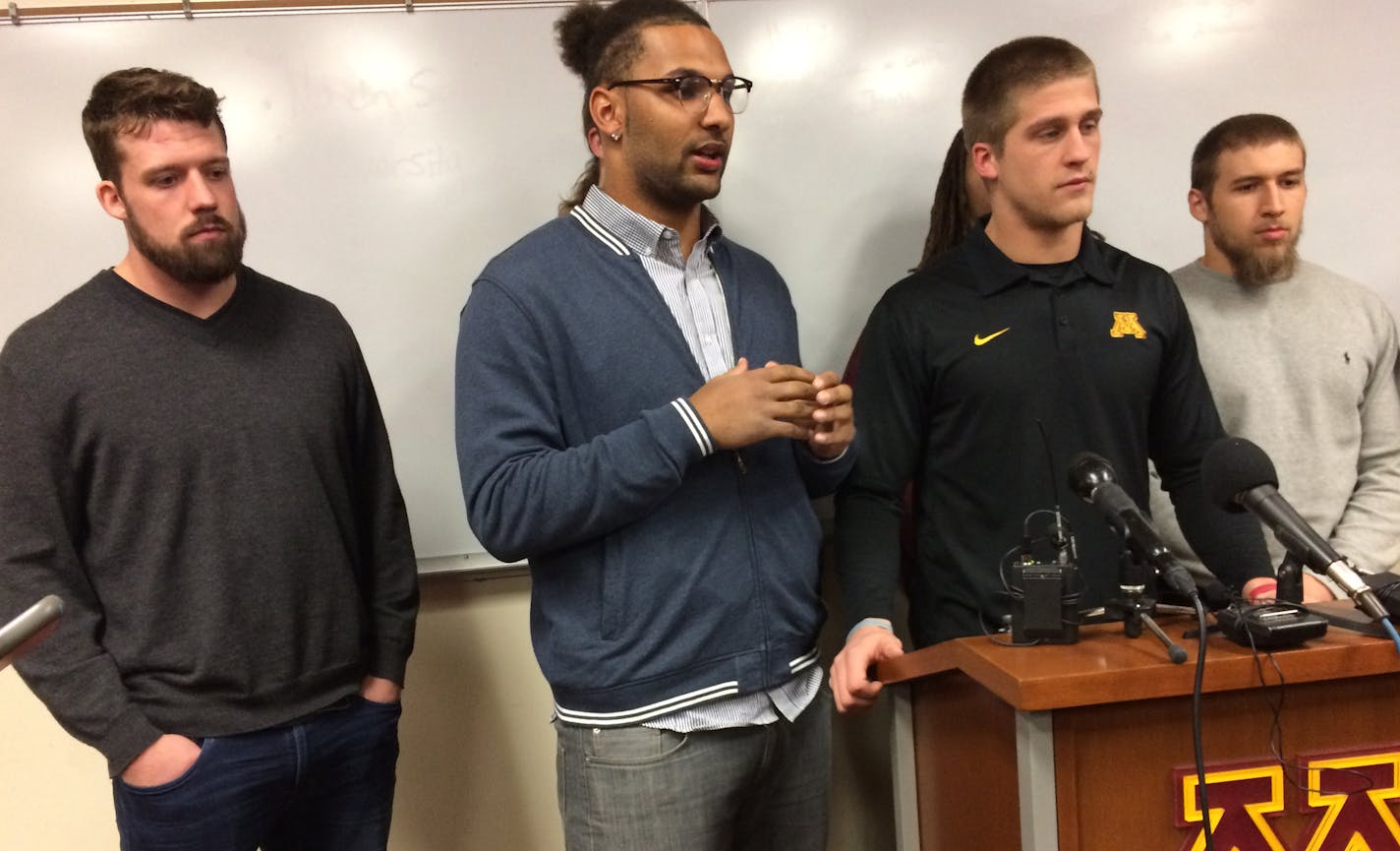 Photo by Joe Christensen, Star Tribune. The University of Minnesota players announced they are ending their boycott of football and plan to play in the Dec. 27 Holiday Bowl. From left, quarterback Mitch Leidner, Gaelin Elmore, Drew Wolitarsky, Jack Lynn (hidden) and, far right, Nick Rallis. 12/17/16.