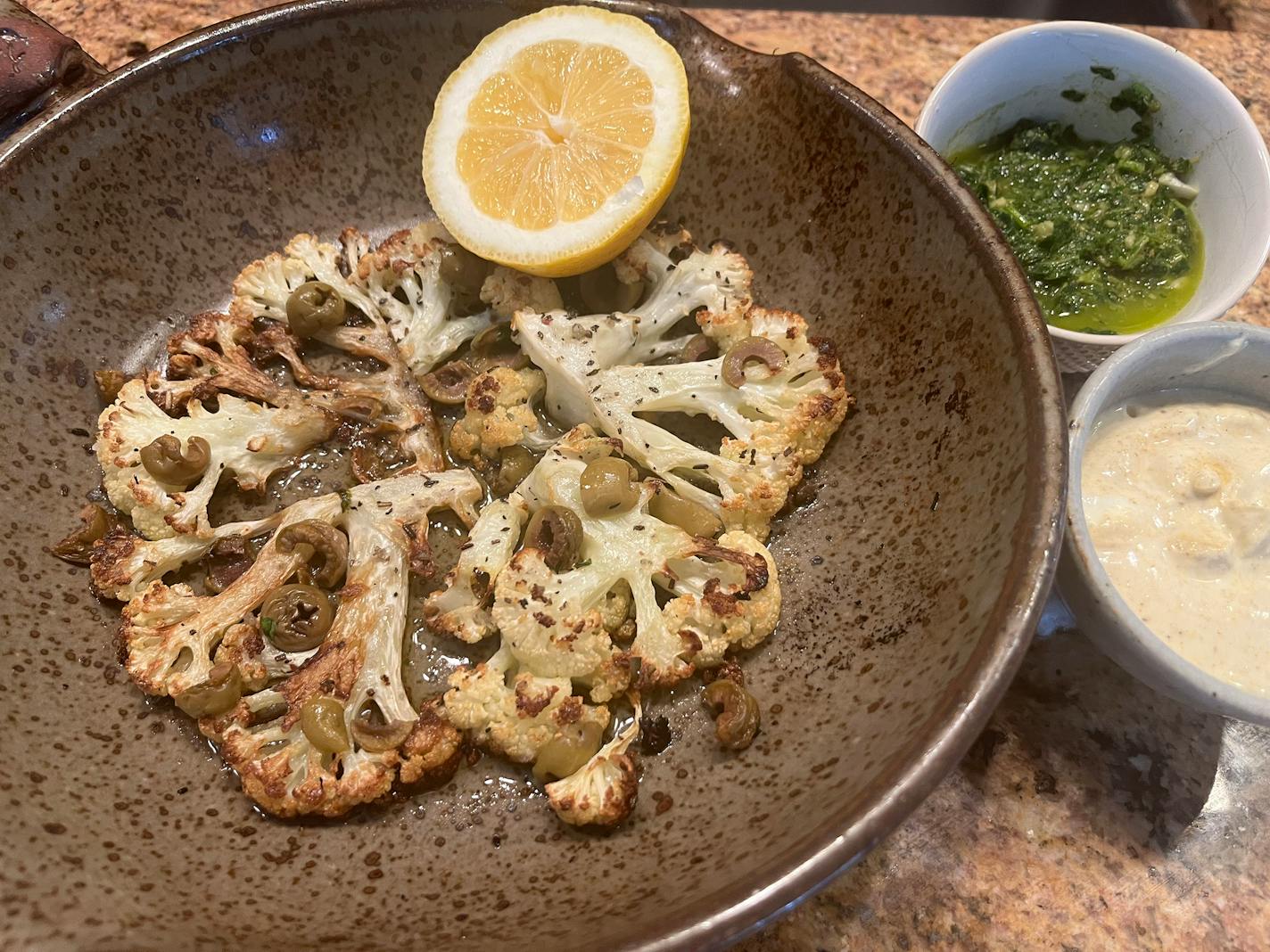 Cauliflower is pan-roasted and finished in the oven using a Flameware pan before being served with bright chermoula and spiced yogurt. Photo and recipes by Beth Dooley, special to the Star Tribune