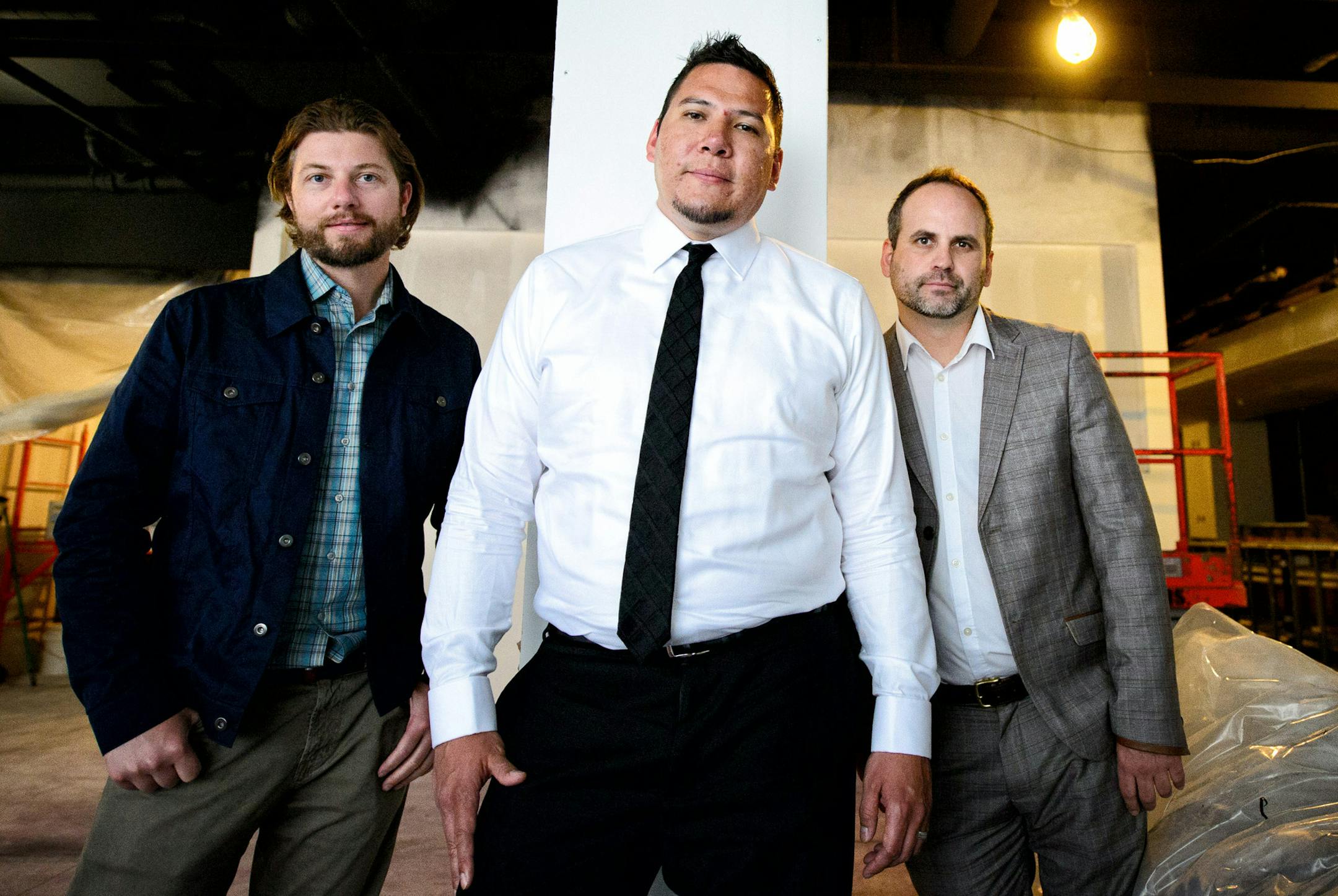 Ben Graves, president of Graves Hospitality; Joe Nayquonabe, CEO of Mille Lacs Corporate Ventures; and Jeff Castillo, vice president of Mille Lacs Corporate Ventures, in the under-renovation Crown Plaza Hotel that will convert later this summer to Intercontinental St. Paul0 Riverfront.