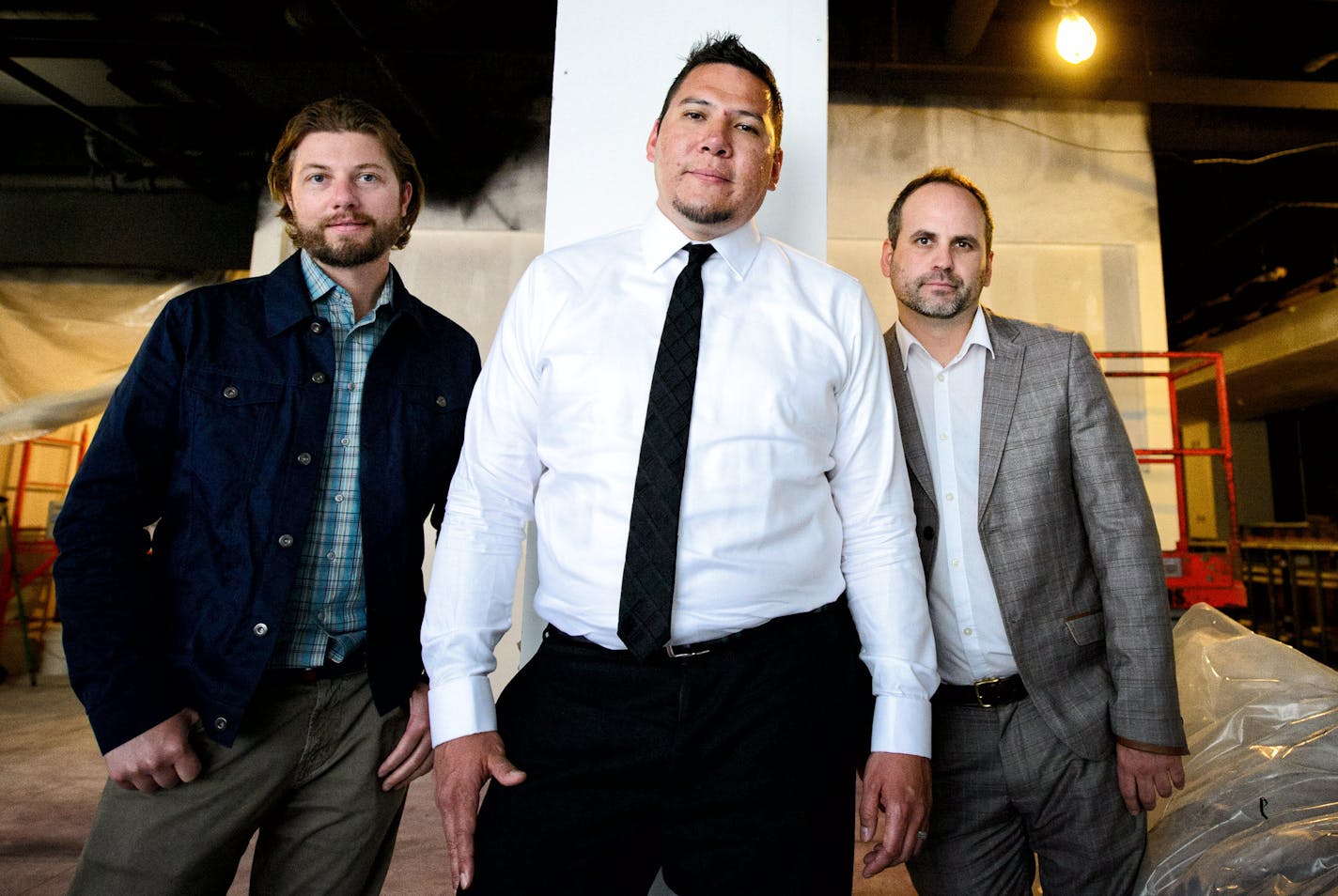 Ben Graves, president of Graves Hospitality; Joe Nayquonabe, CEO of Mille Lacs Corporate Ventures; and Jeff Castillo, vice president of Mille Lacs Corporate Ventures, in the under-renovation Crown Plaza Hotel that will convert later this summer to Intercontinental St. Paul0 Riverfront.