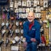 Midwest Mountaineering founder and owner Rod Johnson, poses for a photo in front of his favorite hiking items at the store in Minneapolis.