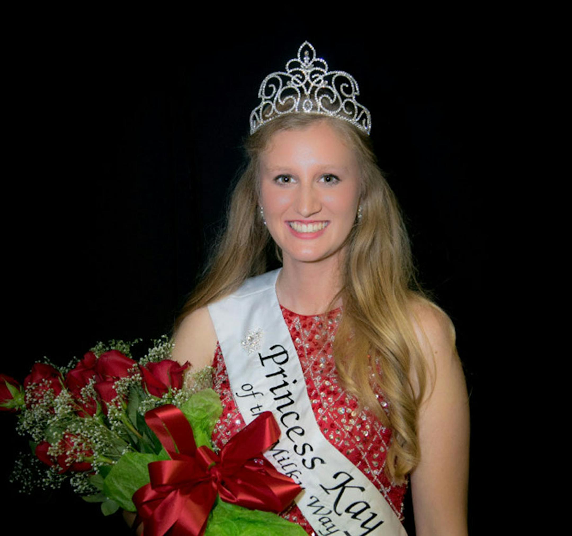 Emily Annexstad poses for a photo after being crowned the 64th Princess Kay of the Milky Way during an evening ceremony at the Minnesota State Fairgrounds, Wednesday, Aug. 23, 2017, in St. Paul, Minn.