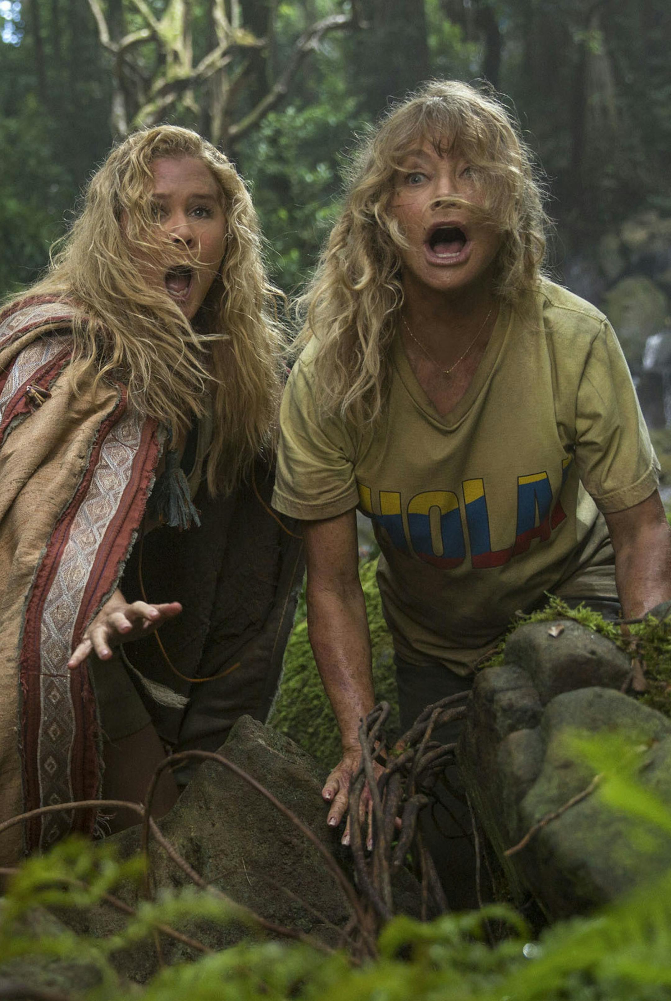 This image released by 20th Century Fox shows Goldie Hawn, right, and Amy Schumer in a scene from "Snatched." (Justina Mintz/20th Century Fox via AP)