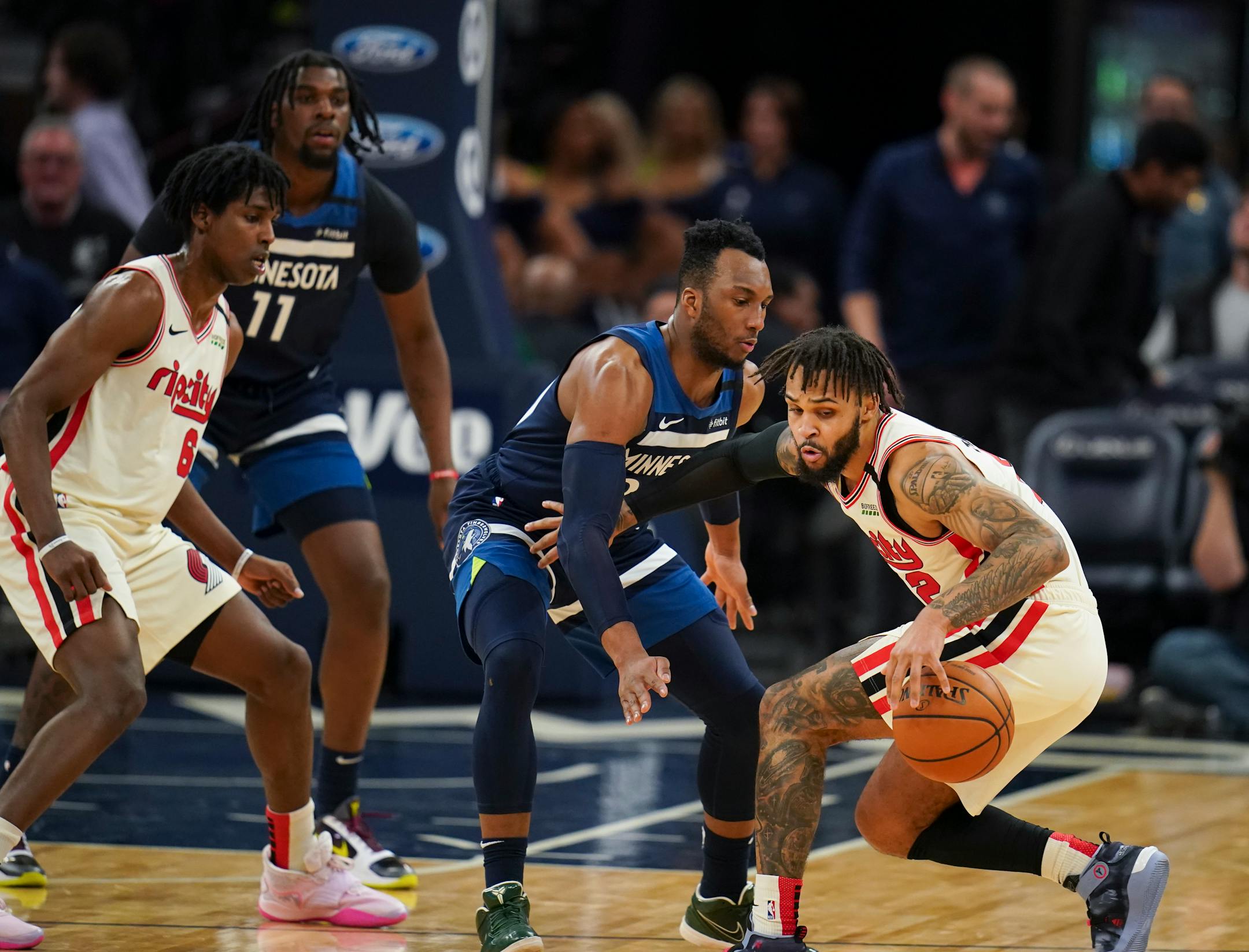 Portland guard Gary Trent Jr, who played high school ball for Apple Valley, put a spin move on Timberwolves guard Josh Okogie