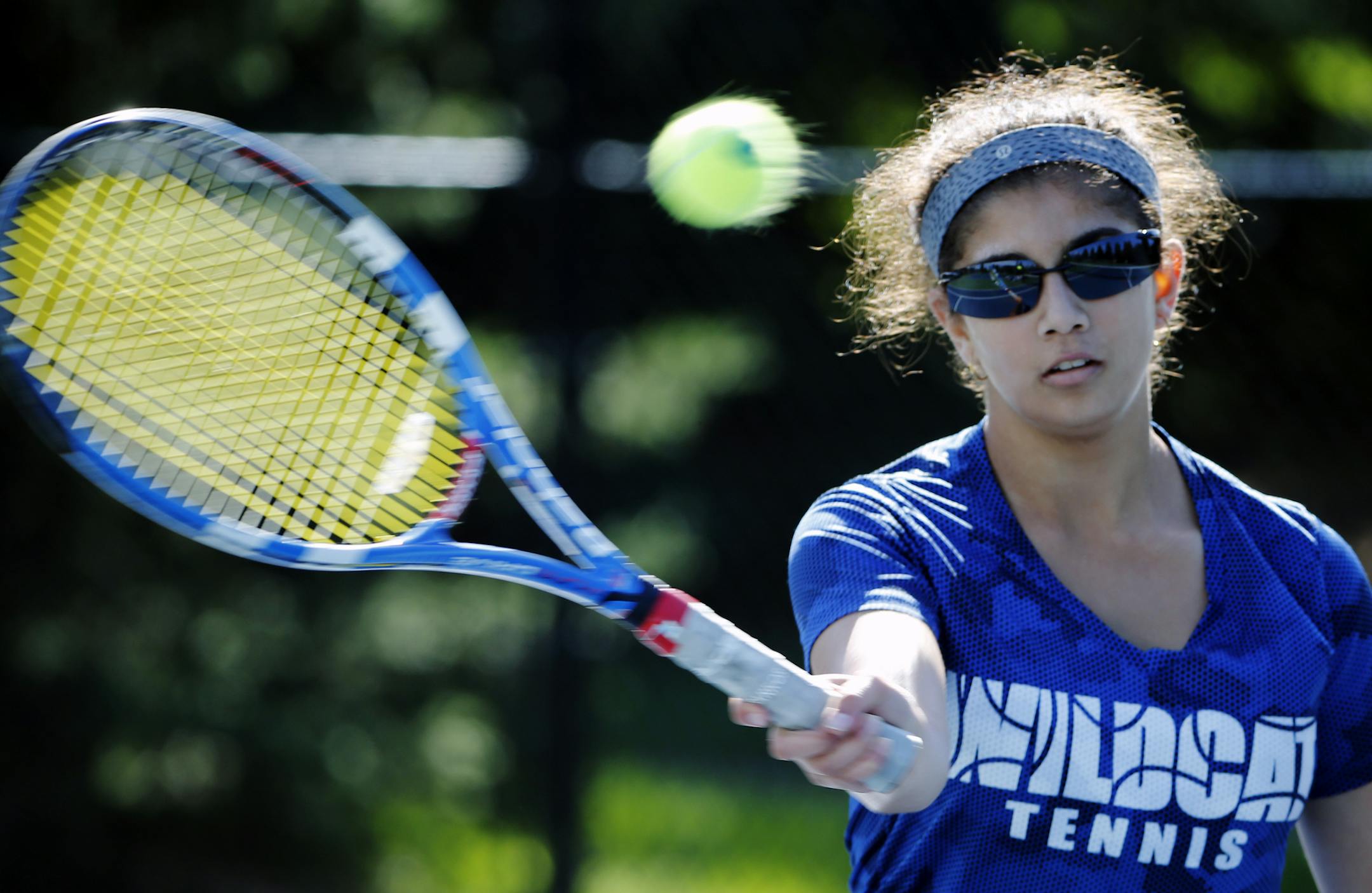 Senior Anusha Arcaguld, one of three captains of the Eagan tennis team, returned a serve during a practice. (Richard Tsong-Taatarii, Star Tribune)