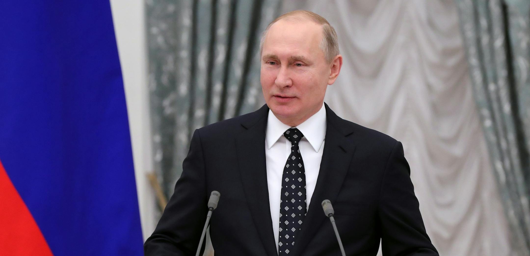 Russian President Vladimir Putin addresses Russian Paralympics Athletes who competed in the 2018 Pyeonchang Winter Paralympics, in the Kremlin in Moscow, Russia, Tuesday, March 20, 2018. (Mikhail Klimentyev, Sputnik, Kremlin Pool Photo via AP)