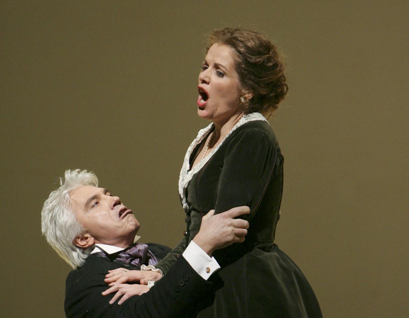 FILE -- Soprano Renee Flemming, right, with Dmitri Hvorostovsky in "Eugene Onegin," at the Metropolitan Opera in New York, Feb. 6, 2007. Though still performing, Fleming signed a five year deal in December 2011, as the first creative consultant for the Lyric Opera of Chicago. (Sara Krulwich/The New York Times) -- PHOTO MOVED IN ADVANCE AND NOT FOR USE - ONLINE OR IN PRINT - BEFORE JAN. 29, 2012. ORG XMIT: XNYT83