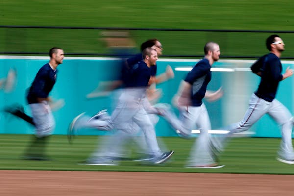 Twins pitcher ran sprints after practice Thursday Feb 20. 2014 in Fort Myers, Florida at Lee County Sports Complex.