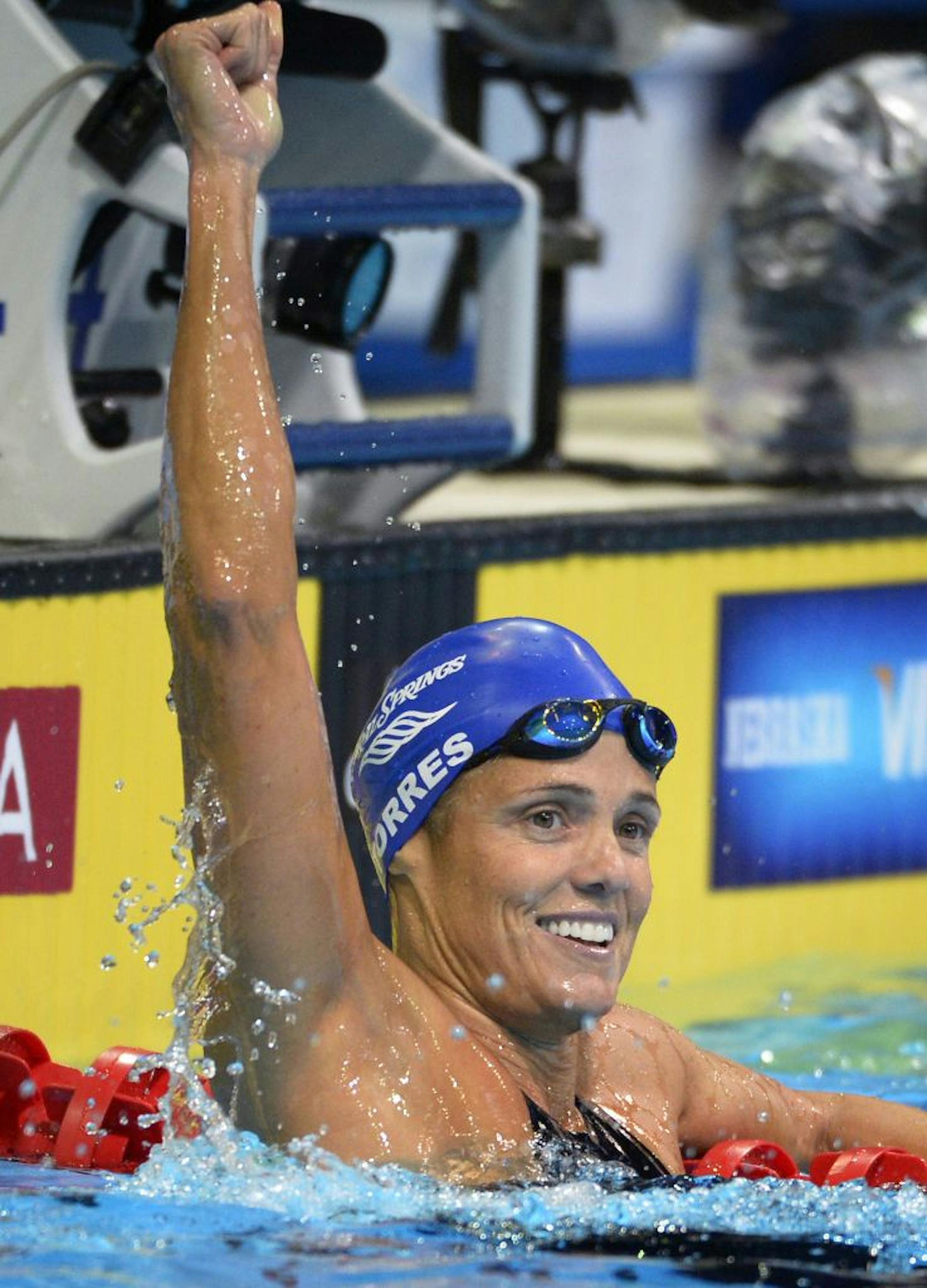 Dara Torres celebrated after a strong effort in the semifinals of the 50-meter freestyle Sunday. Torres, 45, is bidding to qualify for her sixth Olympics.