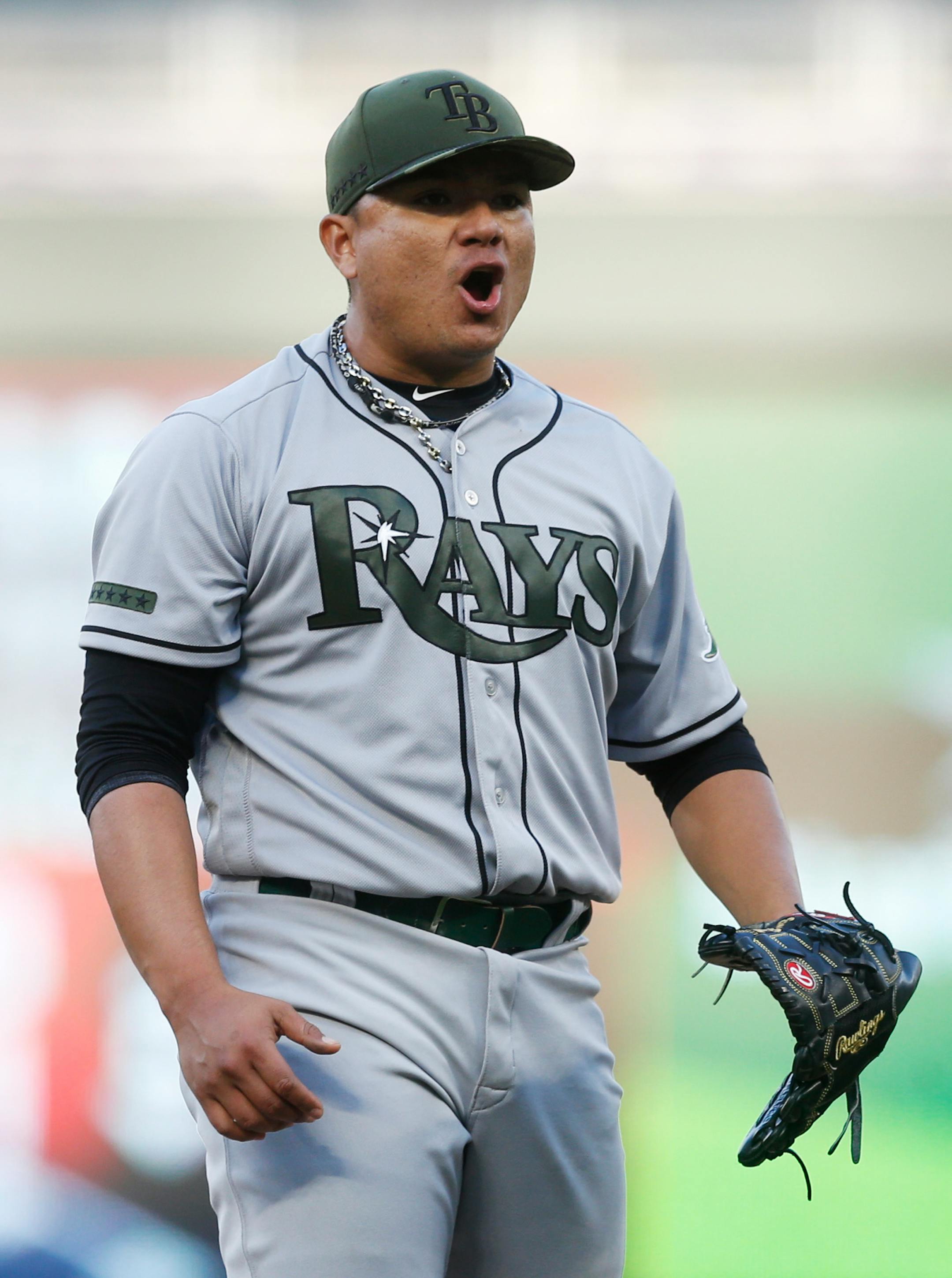 Tampa Bay Rays relief pitcher Erasmo Ramirez celebrates the final out as the Rays beat the Minnesota Twins 8-6 in 15 innings of a baseball game Sunday, May 28, 2017 in Minneapolis. Ramirez got the save. (AP Photo/Jim Mone)
