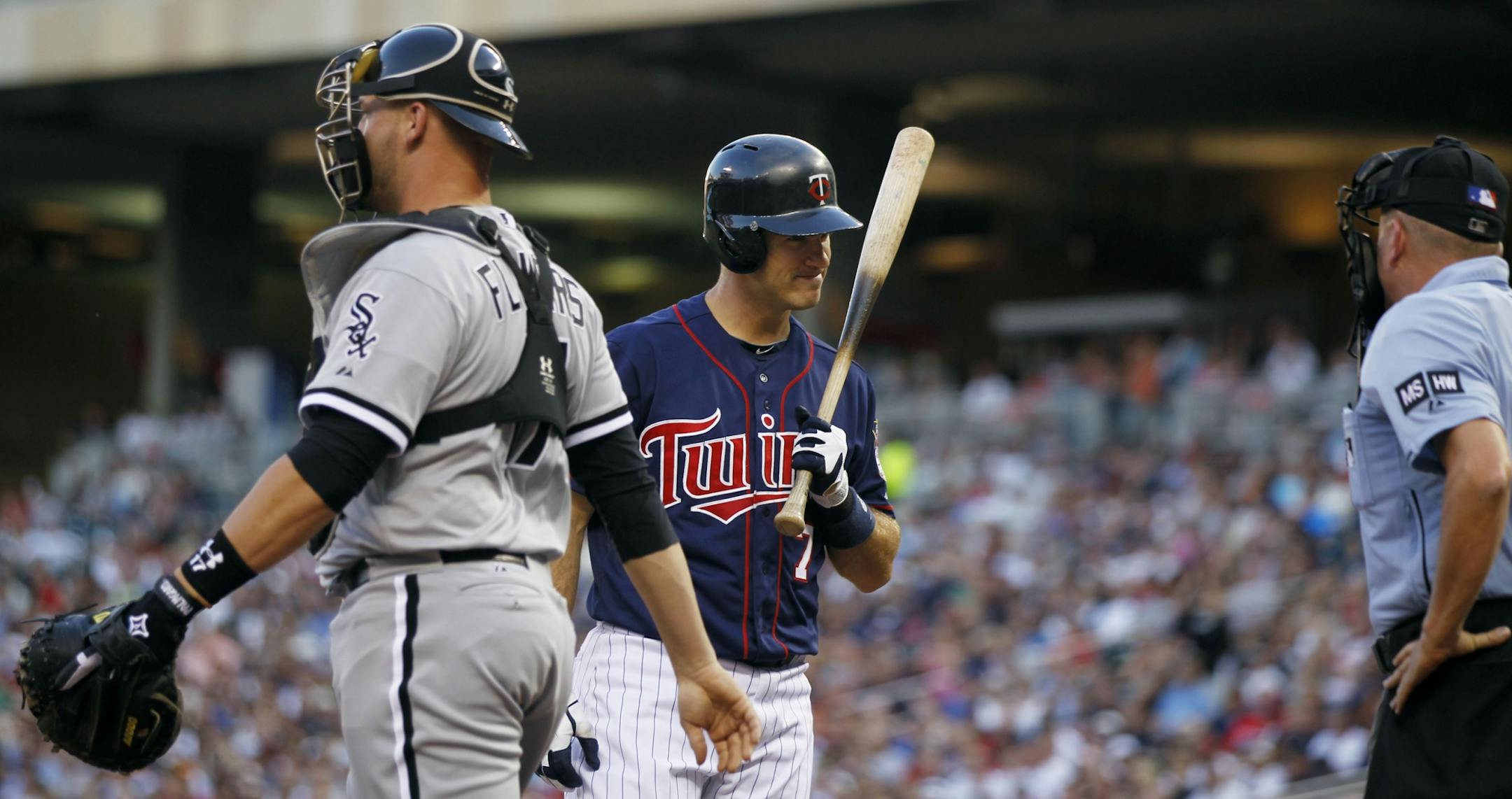 Joe Mauer glared at plate umpire Mike Everitt after being called out on strikes in the third inning. White Sox starter Gavin Floyd struck out nine.