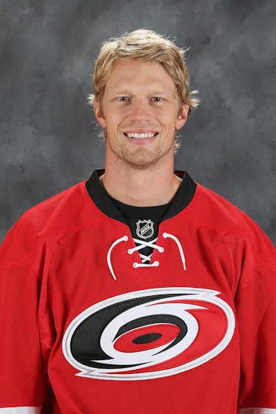 RALEIGH, NC - SEPTEMBER 18: Eric Staal #12 of the Carolina Hurricanes poses for his official headshot for the 2014-2015 season at Carolina Family Prac