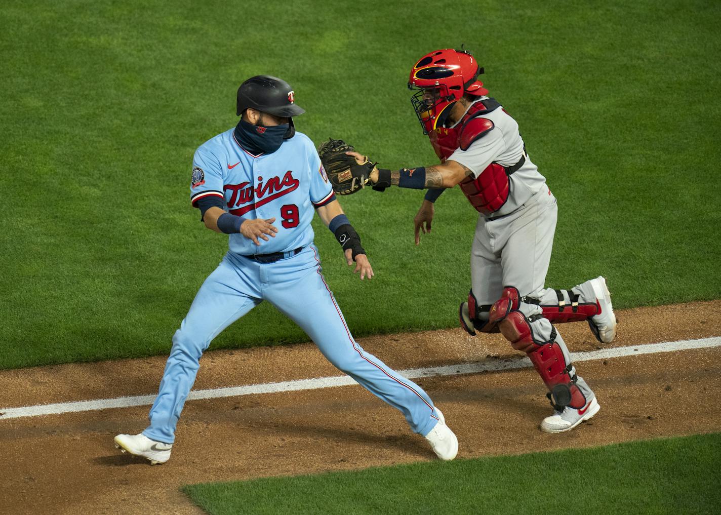 Minnesota Twins third baseman Marwin Gonzalez (9) was out when caught between third and home by St. Louis Cardinals catcher Yadier Molina (4) in the seventh inning. Twins third baseman Josh Donaldson (24) reached first on the fielder's choice. ] JEFF WHEELER • jeff.wheeler@startribune.com The Minnesota Twins defeated the St. Louis Cardinals 3-0 in the second game of their series Wednesday night, July 29, 2020 at Target Field in Minneapolis.