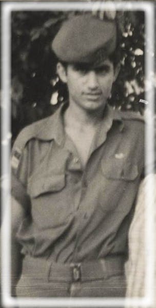 Reuven Rahamim in his military uniform as a young man.