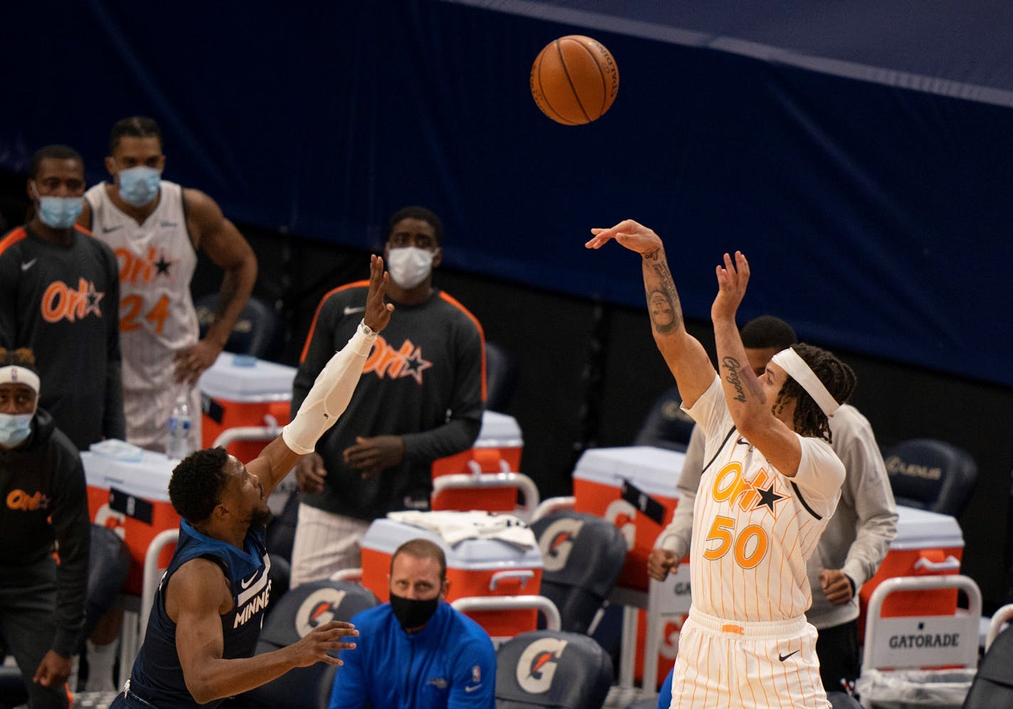 Orlando Magic guard Cole Anthony (50) hit a three pointer over Minnesota Timberwolves guard Malik Beasley (5) that won the game for the Magic. ] JEFF WHEELER • jeff.wheeler@startribune.com