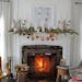 Krystal Kellermann, interior designer for Martha O'Hara Interiors, shows how to create a mantel vignette with an ornament collection. The artwork abov