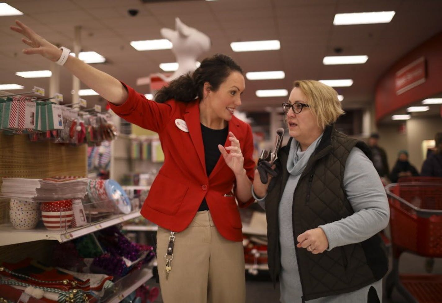 Ridgedale Target store manager Chrissi McShane gave directions to Kathy Ayers, who was looking for an Amazon Echo device.