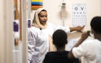 Medical assistant Fathia Salah does an eye exam on patients. ] LEILA NAVIDI &#xef; leila.navidi@startribune.com BACKGROUND INFORMATION: Patients see p