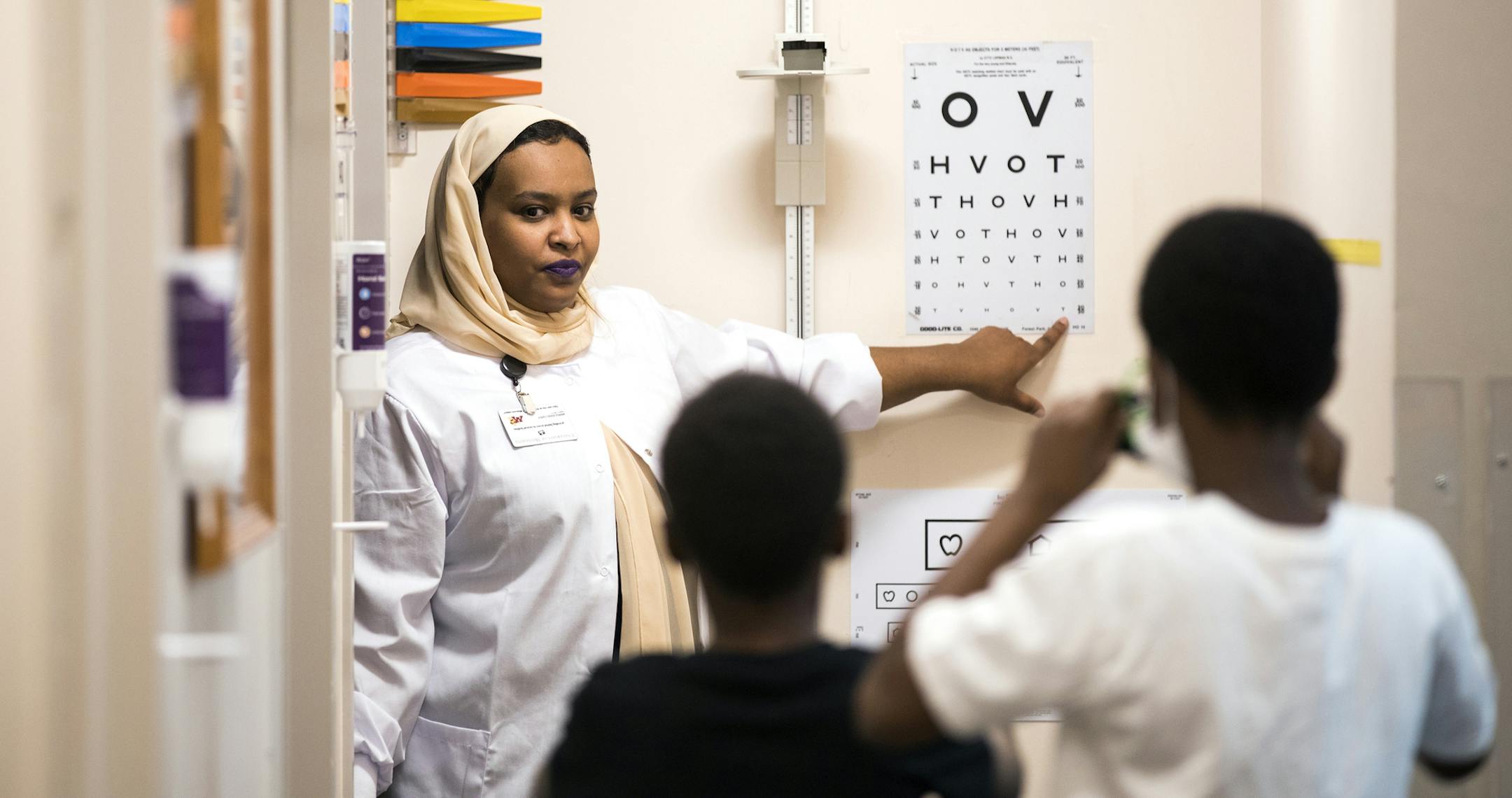 Medical assistant Fathia Salah does an eye exam on patients. ] LEILA NAVIDI ï leila.navidi@startribune.com BACKGROUND INFORMATION: Patients see providers at Community University Health Care Center in Minneapolis on Tuesday, September 26, 2017. While the spotlight has been on Senate Republican efforts to restructure ObamaCare and cut back Medicaid, three key health care programs will lose funding unless Congress acts by the end of the week. This includes $27 million that Minnesota safety net