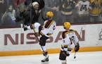 Minnesota Golden Gophers forward Sammy Walker (9) celebrated his first goal as a Gopher in the second period against the Minnesota-Duluth Bulldogs. ] 
