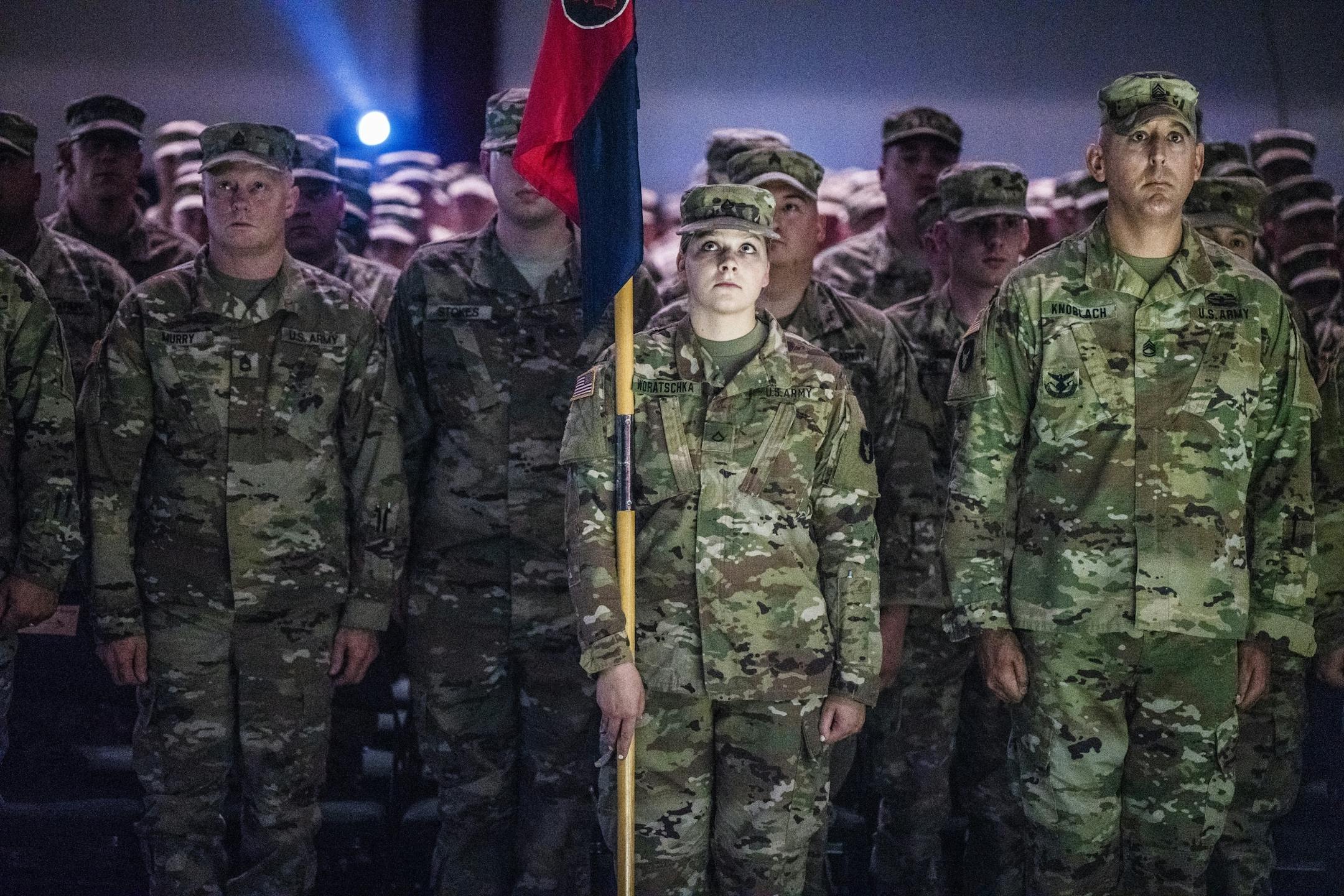 About 650 soldiers including PFC Jessica Woratschka who was holding the flag staff in the 34th Red Bull Infantry Dvision, based in Rosemount, attended a departure ceremony for a nine-month deployment in Kuwait.