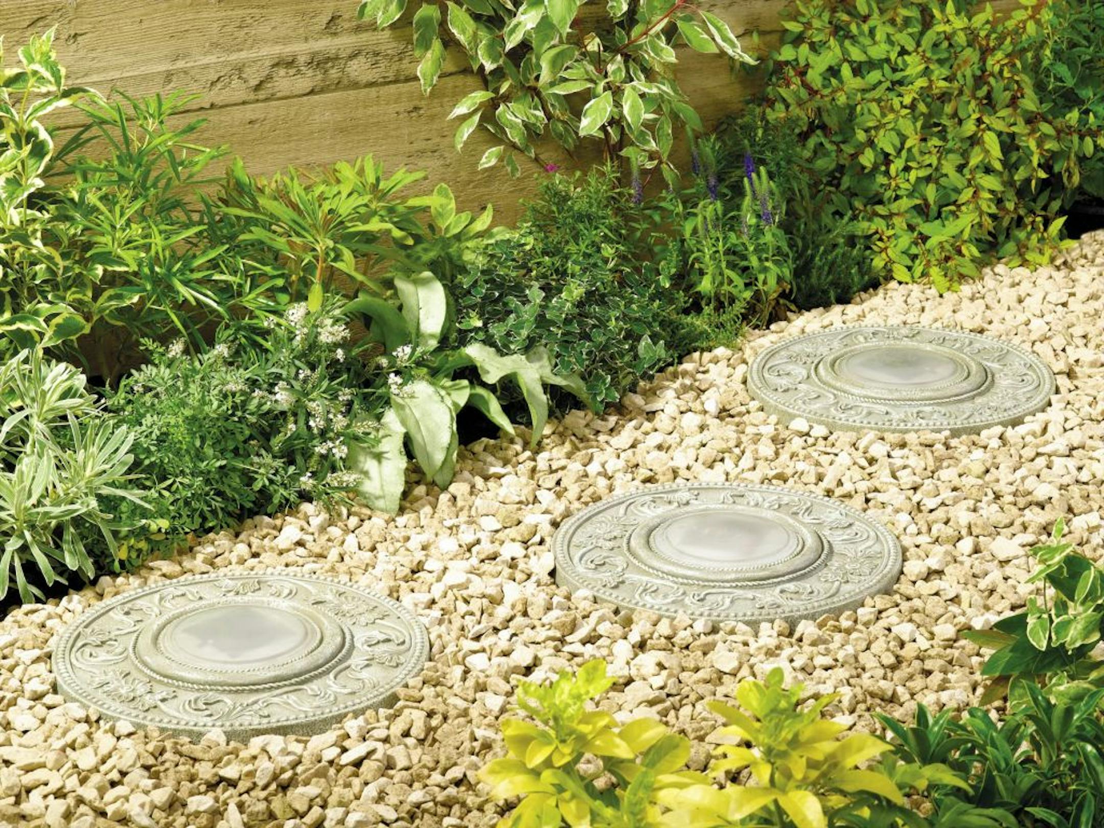 Solar stepping stones light a pathway.