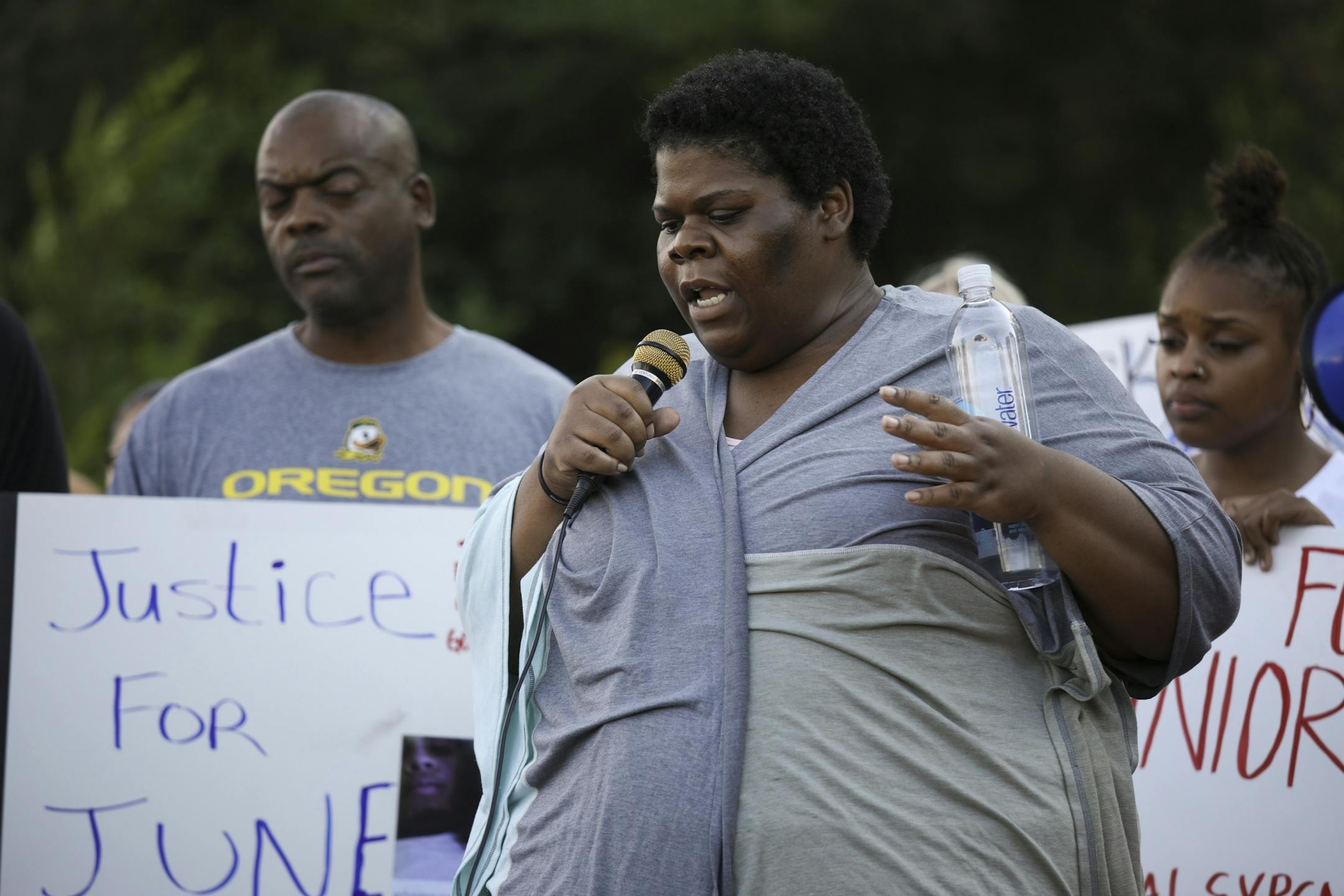 Thurman Blevins' sister, Darlynn Blevins, spoke about her brother to the crowd, gathered in the parking lot of Cub Foods, before they left on the Peace Walk.