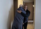 Stanislav Diborov, a recent Ukrainian refugee, hugged his housing case manager Hakizimana Emmanuel a hug as thanks for helping his family move into an