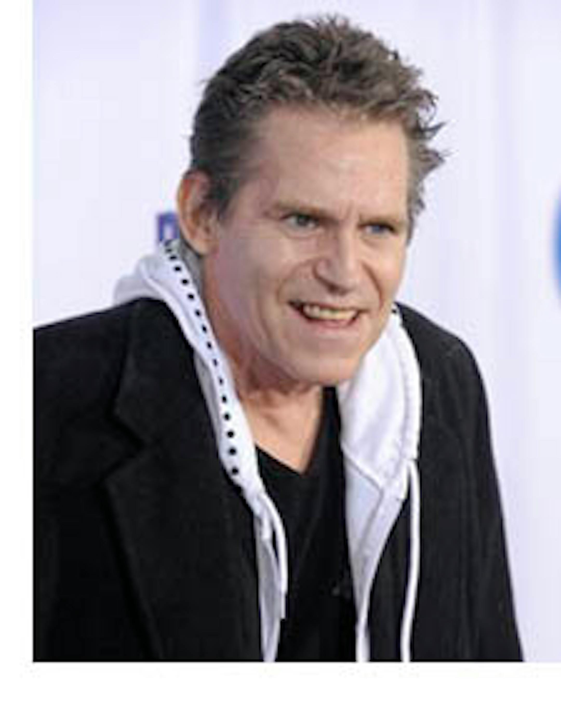 FILE - In this Oct. 13, 2009 file photo, Jeff Conaway arrives at the 2009 Fox Reality Channel Really Awards in Los Angeles. Conaway's manager says the former star of "Taxi" is hospitalized in critical condition. The actor was found unconscious last week from a drug overdose, possibly pain pills, manager Phil Brock said Wednesday, May 18, 2011. (AP Photo/Chris Pizzello, File)