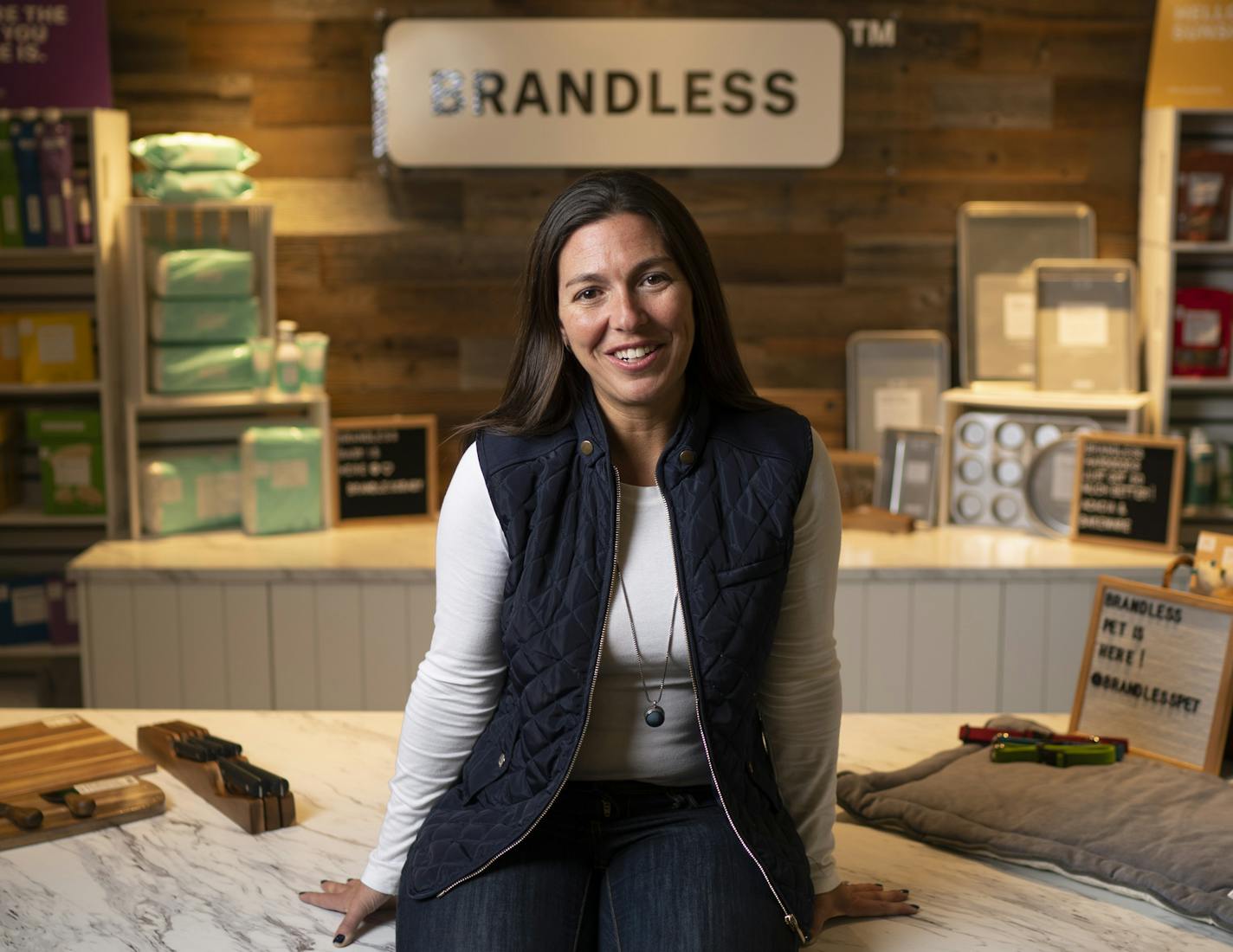 Rachael Vegas, chief merchant of Brandless, was photographed Tuesday afternoon with some of the new products lines launching this week. ] JEFF WHEELER &#x2022; jeff.wheeler@startribune.com Brandless.com is a fast growing e-commerce startup headquartered in San Francisco and Minneapolis and is making its biggest announcement in its 2-year history Wednesday. The company sells food and household goods -- all for $3 -- and is launching baby and pet products Wednesday. The company is trying to remove