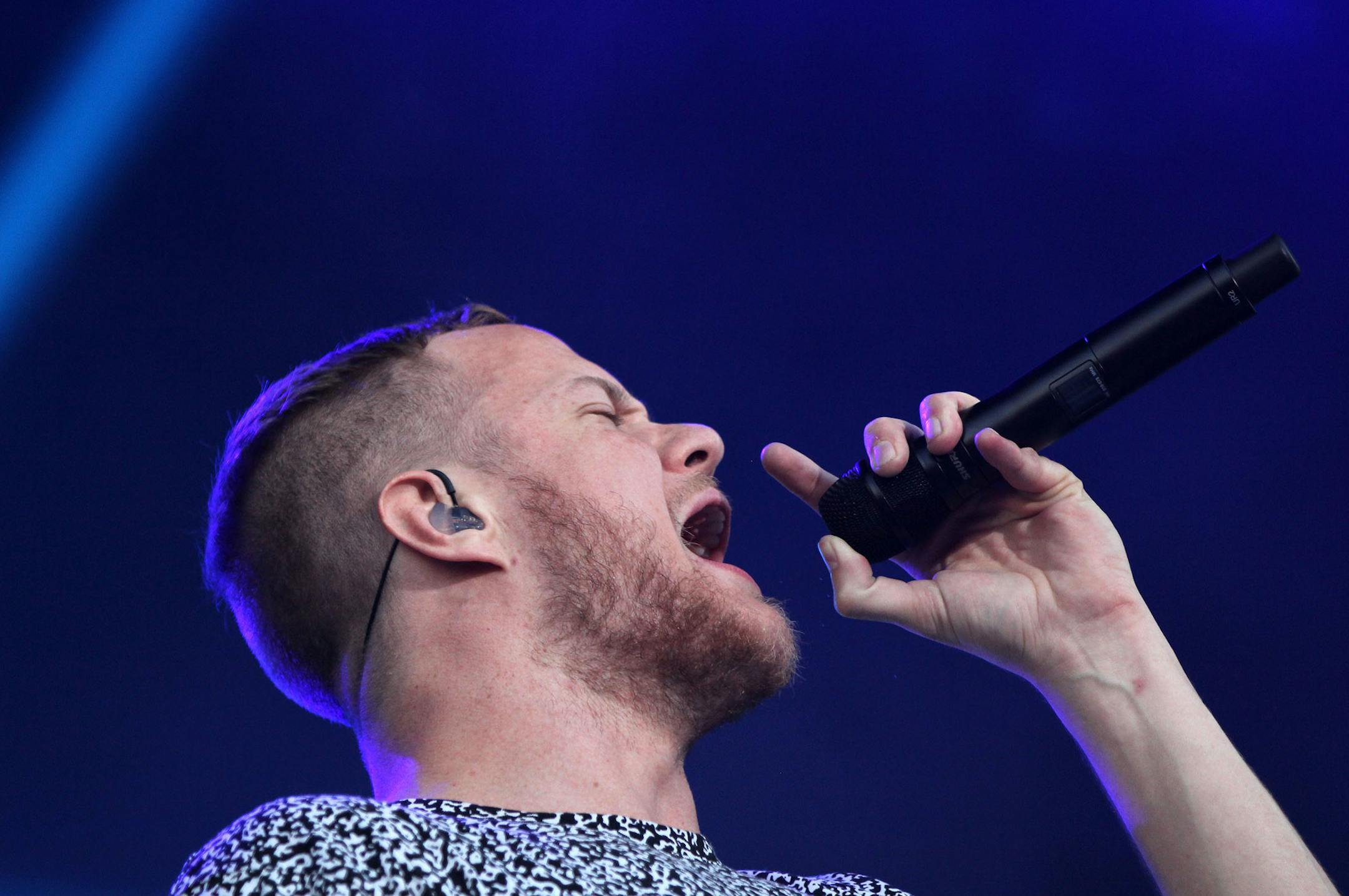 Dan Reynolds of Imagine Dragons performs at the All Star Concert on Saturday night at TCF Bank Stadium. ] MONICA HERNDON monica.herndon@startribune.com Minneapolis, MN 07/12/14